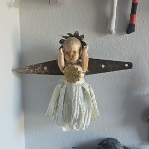 Vintage Doll Wall Decor with Cream and Brown Accents